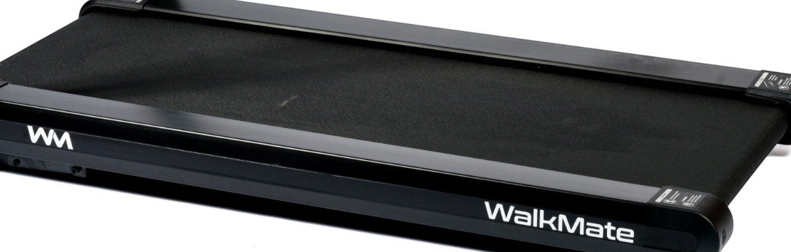 Black WalkMate folding treadmill with an integrated handlebar and smartphone mount, shown from a front three-quarter angle on a white background.
